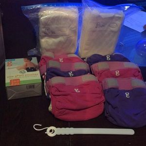 3 Pink and 3 Purple medium cloth gDiapers (used)